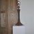 Remarkable 20th century slender bronze lamp by Stewart Ross James for Hansen with later burlap drum shade..