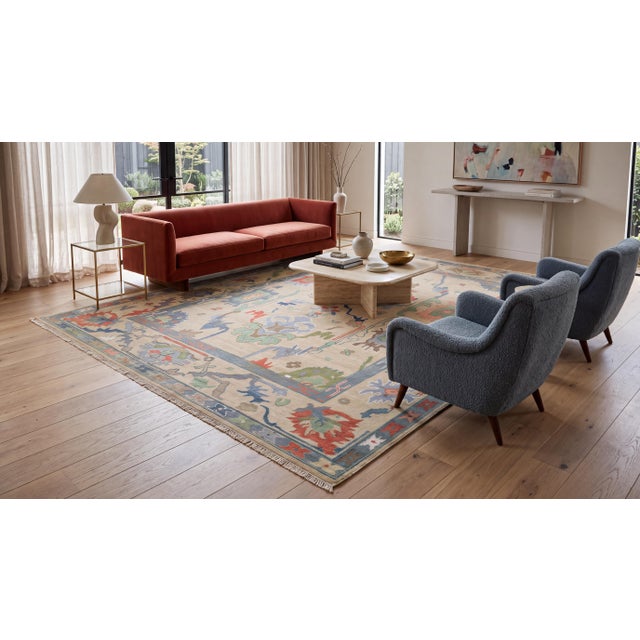 Elevate your interior with this exceptional Modern Oushak-style hand-knotted wool rug, designed for high-end residential...
