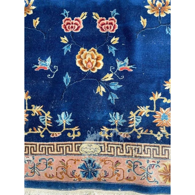 Pretty mid century Turkish Hereke rug with a design of Chinese rugs and beautiful colors with blue field, entirely and...