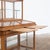 Antique fir display cabinet dating from the early 20th century. It consists of two sections. The lower section, largely...