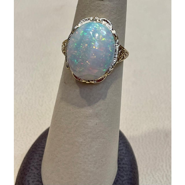 9 Carat Oval Shape Ethiopian Opal Cocktail Ring 14 Karat Yellow Gold For Sale - Image 11 of 18