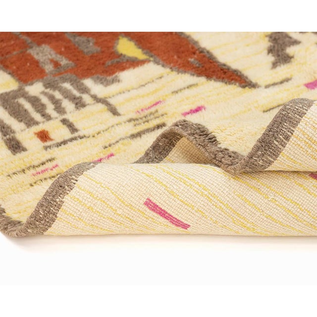 Intricate Hand-knotted wool rug with an Ivory base, adorned with abstract patterns in Sunlit Sienna, Emerald Green, Misty...