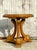This exquisite Vintage Regency Tabouret Table embodies timeless elegance and intricate craftsmanship. The circular wood...