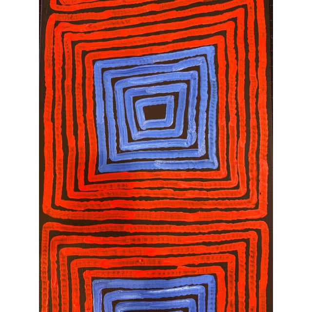 A triptych panel painting by Australian Aboriginal artist Ronnie Tjampitjinpa (1943-2023). Entitled "Tingari Cycle", the...