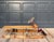 Original vintage steerable sledge or steerable toboggan. This sledge, often referred to as a bobsleigh, features two...