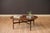 Vintage low profile round coffee table in walnut manufactured by Stanley Furniture Company, circa 1960's. This unique two-...