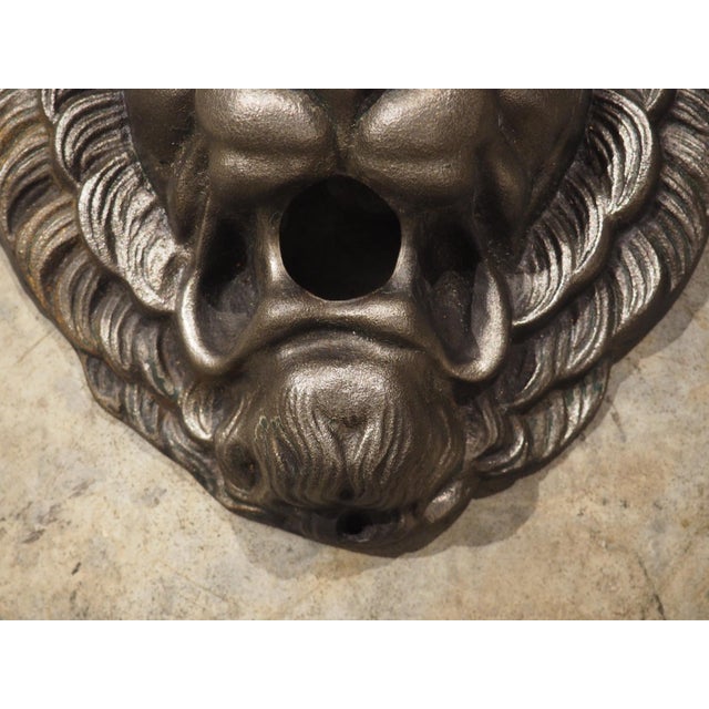 This quaint fountain element or spout was produced in France about the 1920s. Known as a mascaron, the cast iron lion is...