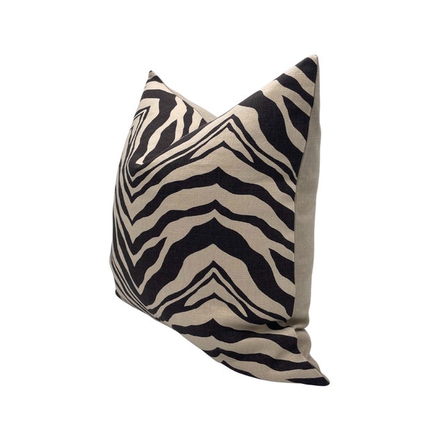 Pair of handcrafted pillows fashioned with Designer Zebra fabric on the front and backed in a flax colored linen....