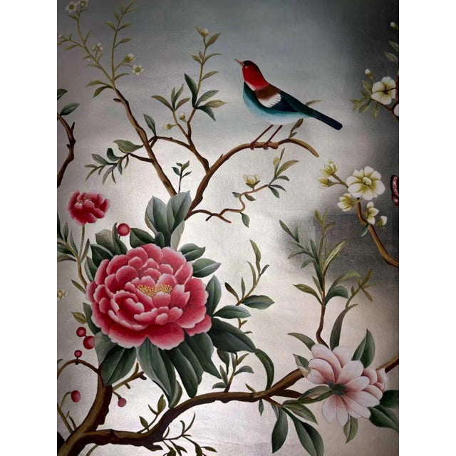 A pair of breathtaking hand-painted Chinoiserie wallpaper panels, crafted on a luxurious soft champagne gold leaf base....