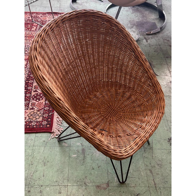 Vintage Rattan Armchair by Teun Velthuizen for Urotan, 1950, in Good conditions. Designed 1950 to 1959 This piece is...
