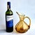 Offered is a vintage hand-blown Rainbow Glass optical ribbed pitcher in amber. It has an applied handle and an unpolished...
