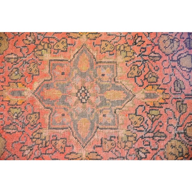 An amazing circa 1920 Persian Sarouk Farahan rug with a wonderfully stylized floral pattern woven with natural vegetable...