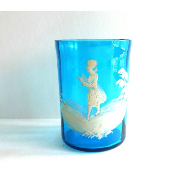 An antique Mary Gregory glass tumbler -- very early model, c. 1880s, from the Bohemian makers in the Czech Republic. White...