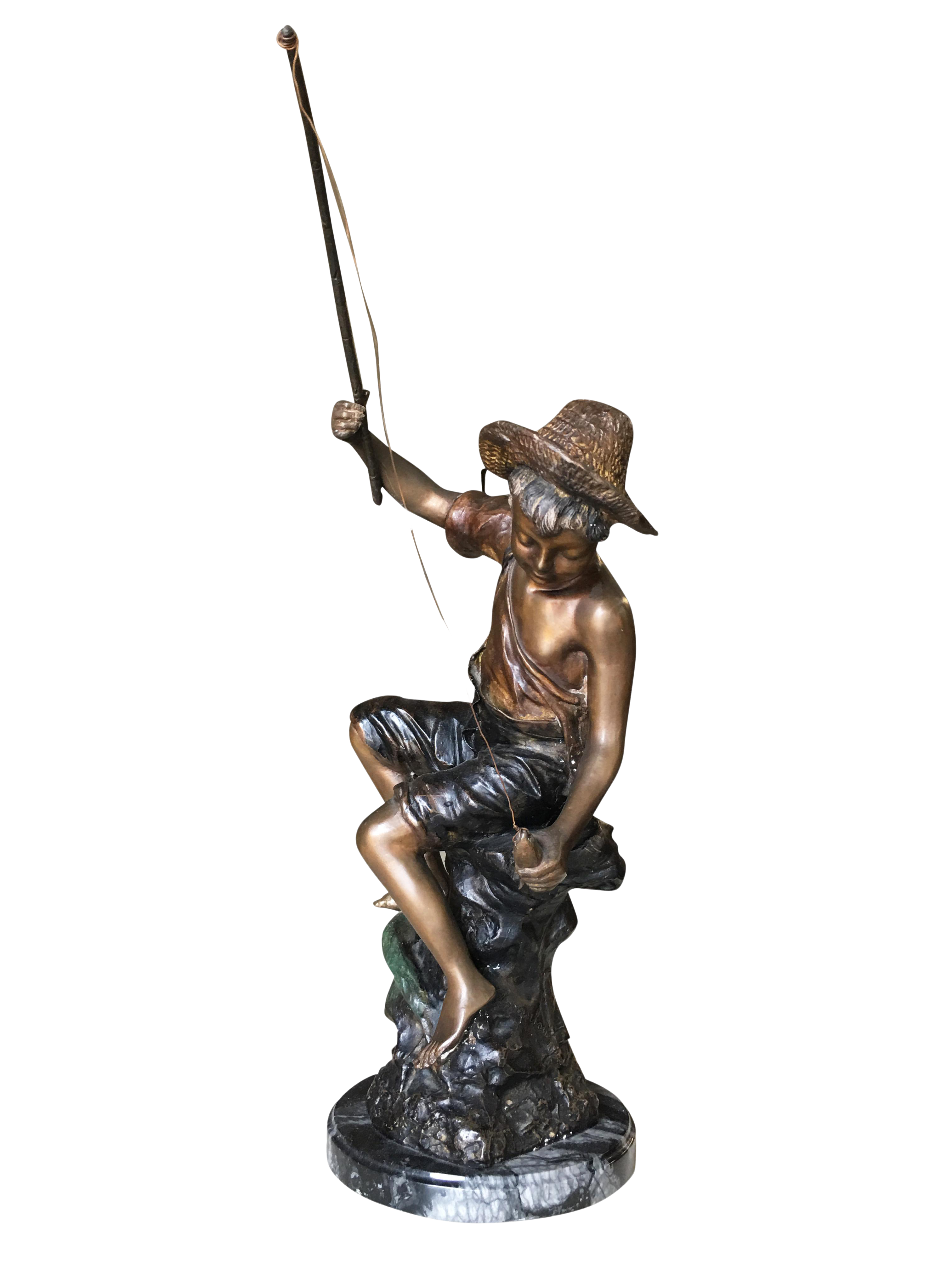 boy fishing figurine