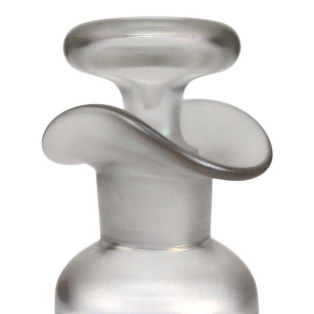 An exquisite antique Steuben Verre de Soie glass decanter, dating to approximately 1920. This exceptional piece showcases...