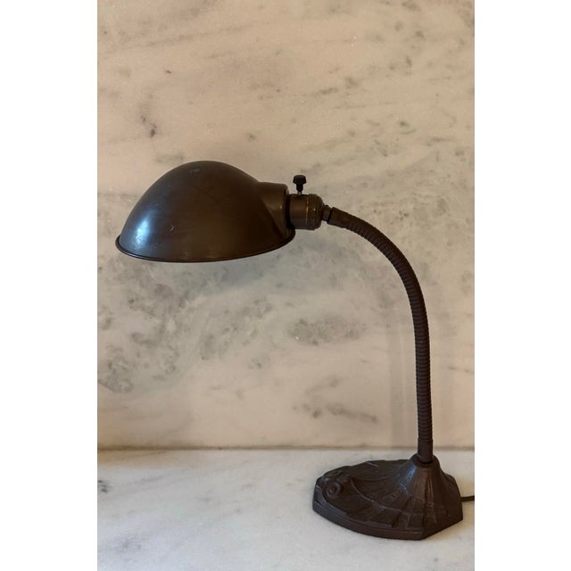 Antique Art Nouveau cast iron gooseneck desk lamp made in Decatur, IL for Faries Fosteria. Gooseneck is adjustable. Makers...