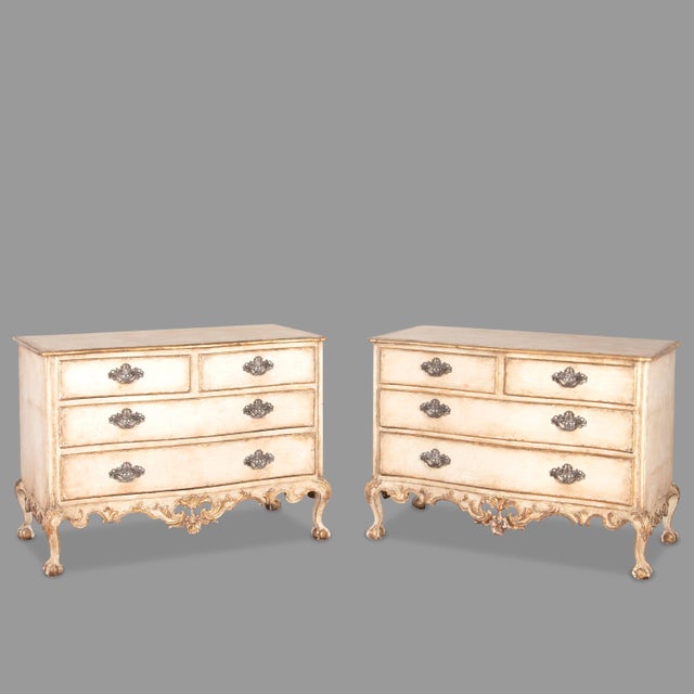 Fantastic pair of c18th portuguese serpentine commodes with the original cream decoration and gilt highlights. By dom...