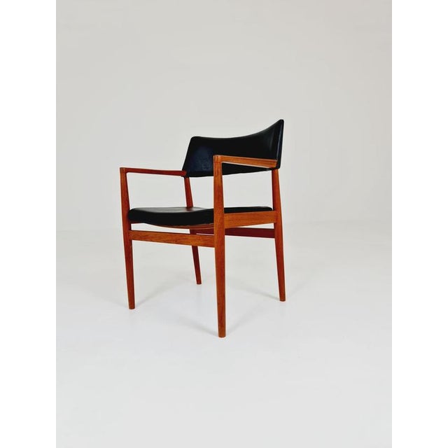 Danish Rare Teak Armchair by Erik Kirkegaard, Model 43 Desk Chair, 1960s. The chair is in great condition; however, as...