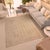 Crafted by skilled artisans using time-honored weaving traditions, this antique low pile handmade wool rug embodies the...