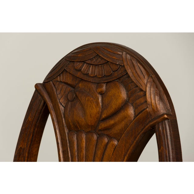 1930s set of six French Art Deco dining chairs, crafted in solid maple and sourced in Provence, France. Distinguished by...