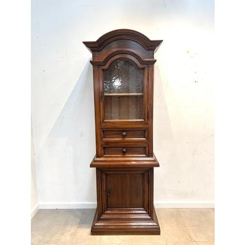 Beautiful classic wooden cabinet featuring an elegant vitrine top with arched detailing and a solid base cabinet. This...