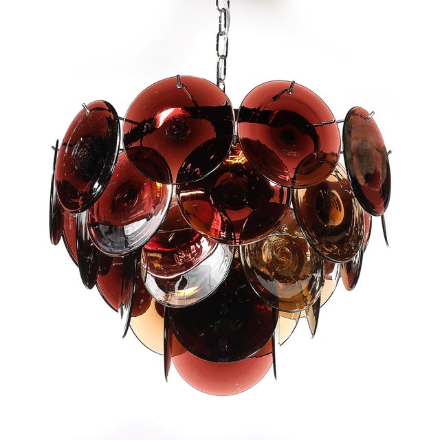 This exquisite pair of Mid-Century Modernist chandeliers, crafted in Murano, Italy circa 1980, embodies the impeccable...
