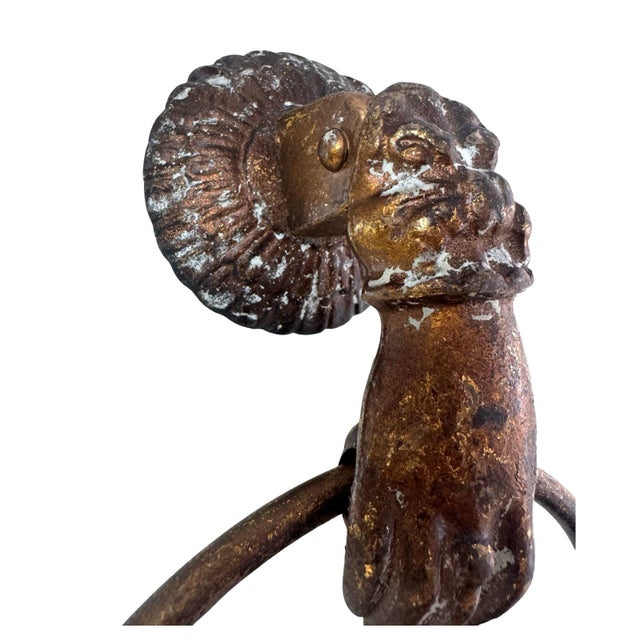 A charming vintage towel ring featuring a sculptural lion motif and beautifully aged gilt-metal finish. The circular ring...