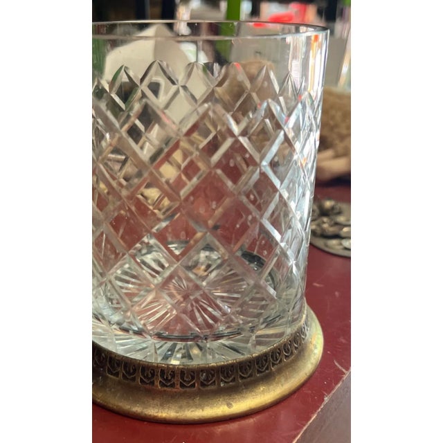 Elevate your decor with our Crystal and Brass Vase, a stunning blend of timeless beauty and opulence. Explore my other...