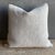 Creamy white hemp rug pillow with original seams. Soft hand, linen blend backing with zipper closure. Spot cleaning is...