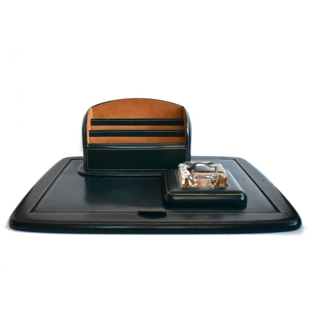 A vintage mid-century Florentine Italian green leather desk set with gold gilt embossed borders, including a blotter,...