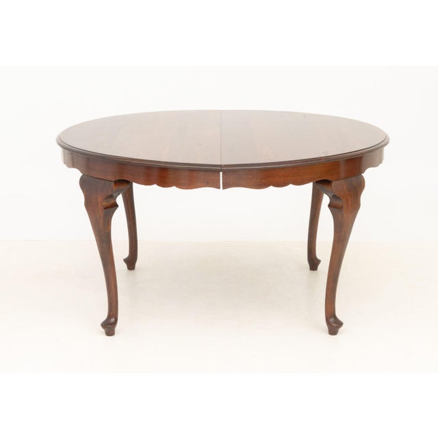 Queen Anne Style Mahogany Circular Dining Table, on four tapered legs with rounded feet. 29" H x 35" Diameter. Provenance:...