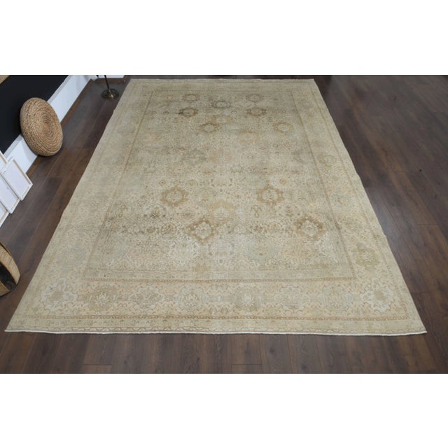 Vintage Persian Hand-Knotted vintage rug is a semi- vintage area rug.'70s Eastern region of Persian's unique rug is...