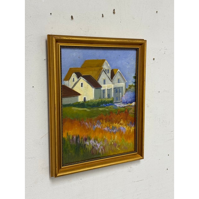 Design Plus Gallery presents a Framed Art Work of a White House in a Flower Blanketed Field. The piece has vibrant use of...