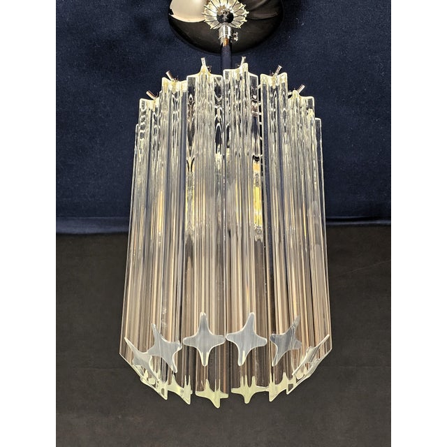 Timeless vintage murano ceiling lamp, venini-style, 1970s. Featuring 14 murano glass crystal quadrihedral prisms. With a...