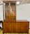 Stunning mid-century two-piece credenza and china cabinet, features classic clean lines, elegant wood grain, and modular...