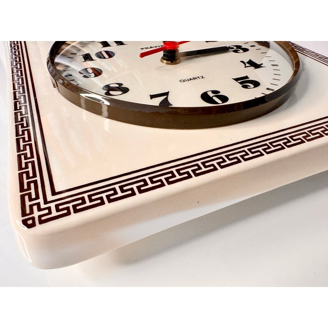 Charming original Prätina ceramic wall clock from the 1970s with a beautiful mid-century character and a decorative...