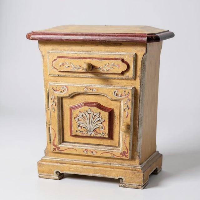 Elegant lacquered, and hand-painted wood in classic style, featuring refined red lines and decorative details. Each piece...