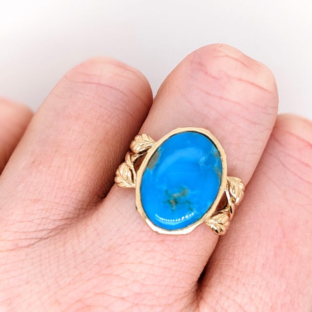 This beautiful ring features a 5.34 carat Turquoise gemstone with natural earth mined diamonds set in solid 14K gold. This...