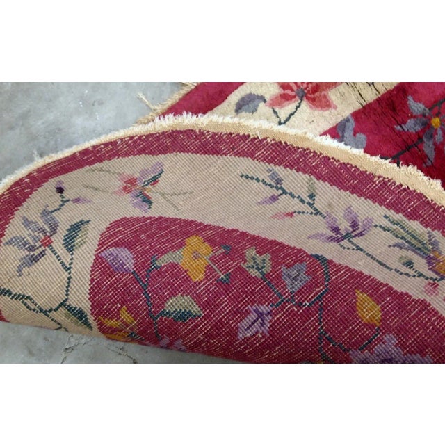 Antique Art Deco Chinese rug in original condition, it has full pile but a stain on the fringes. It is from the beginning...