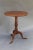 Fine quality antique English solid mahogany tilt top table with a one board top. It is raised on a hand turned pedestal...