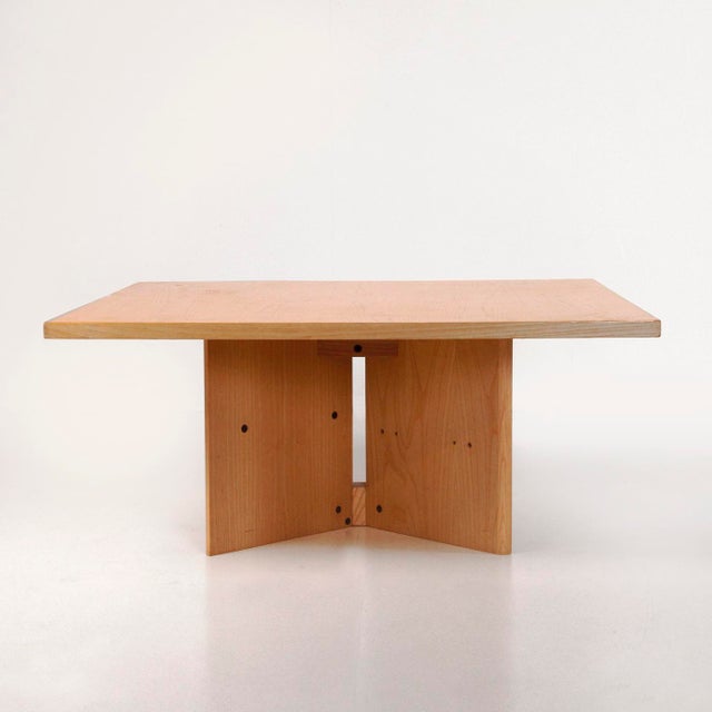 Square coffee table, Italian-made in the 1970s, made of ash wood. Good overall condition, with a scuff mark on the top.