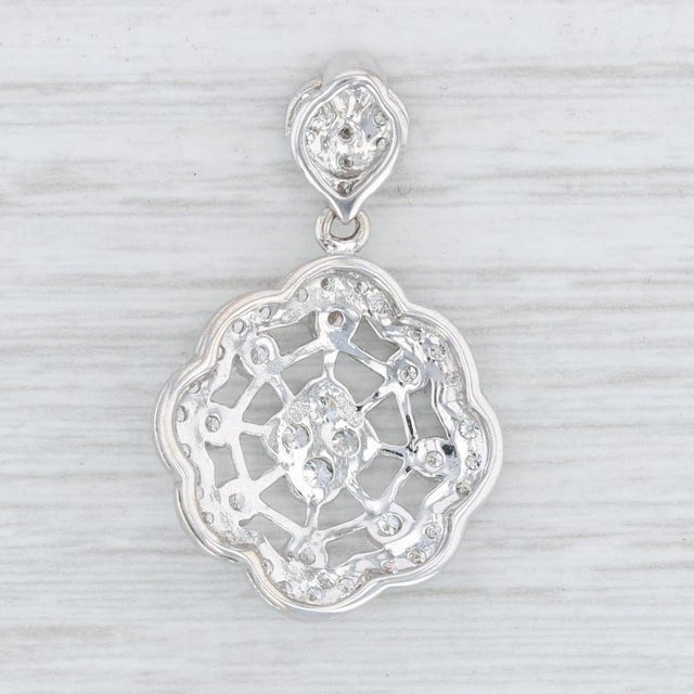Stone Information: Natural Diamonds - Carat: 0.85 ctw Cut: Round Brilliant Clarity: VS2 - SI2 Color: G - H Metal Content:...