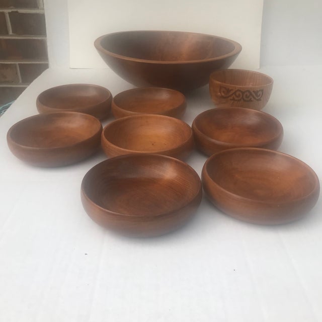 This is a set of thick quality heavy handcrafted wood salad bowls with matching large handcrafted wood serving bowl. There...