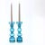 Blue transparent candle holders, set of 2. A groovy pair of curvy aqua-blue glass pompadour candlestick holders, perfect...