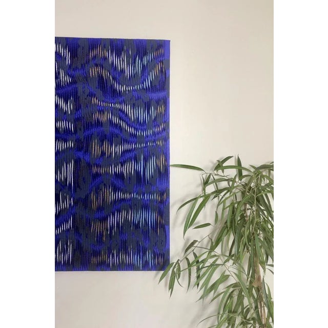 Painting obtained from a repeated and random folding to the rhythms of the horizontal lines of the waves are formed to...