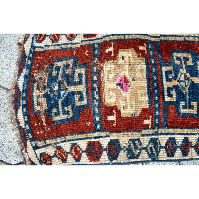 This is a vintage Turkish Oushak rug from the 1960s. The piece was hand-knotted.