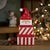 Add a touch of whimsical holiday charm to your decor with this Ceramic Stacking Santa Canister Set. Featuring a jolly...