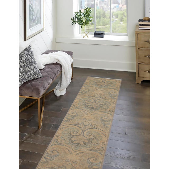 Enhance the ambiance of your home with this magnificent Persian-influenced Turkish hand-knotted rug made by skilled...
