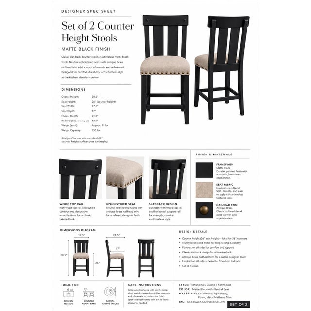 Set of two counter height stools in a matte black finish with neutral upholstered seats and nailhead trim. Clean, modern,...