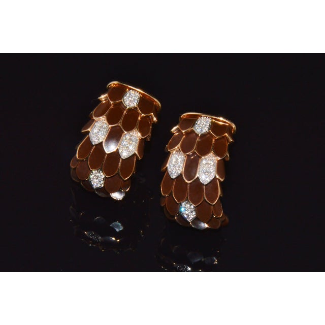 Authentic Roberto Coin Animalier natural diamond 18K rose and white gold feather earrings. These exquisite designer...